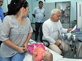 Russian surgeon examines children with heart problems