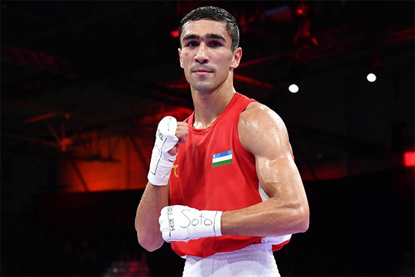 Boxer Abdumalik Khalokov advances to the semifinals