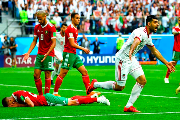 Iran beat Morocco with 95th-minute own goal