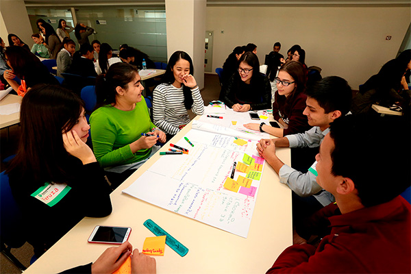 A group of girls undergo training in Ideathon seminar