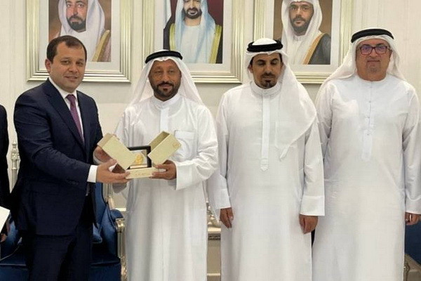 A meeting takes place with the Chairman of the Sharjah Chamber of Commerce and Industry