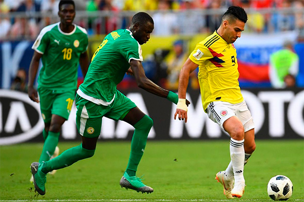 Colombia and Japan advance to last 16 of World Cup