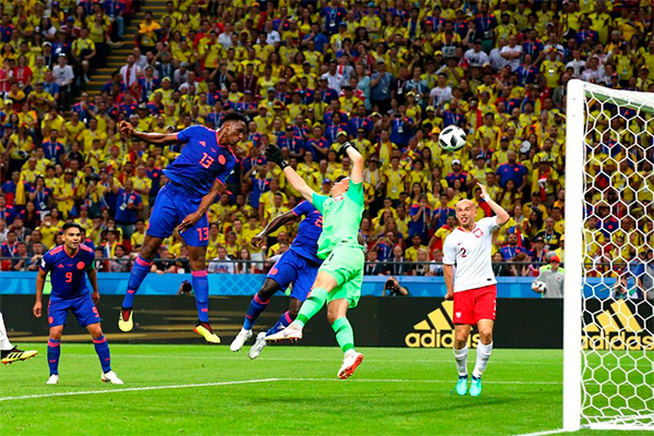 Columbia beat Poland to keep their World Cup hopes alive