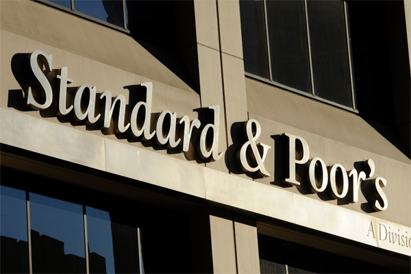 S&P report says Kazakhstan’s currency devaluation will add to credit risks in its banking sector